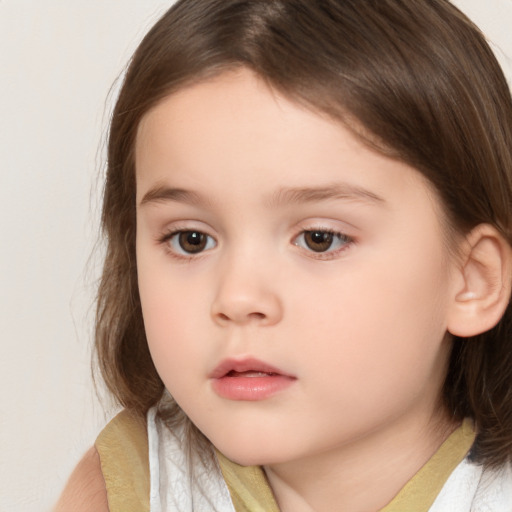 Neutral white child female with medium  brown hair and brown eyes