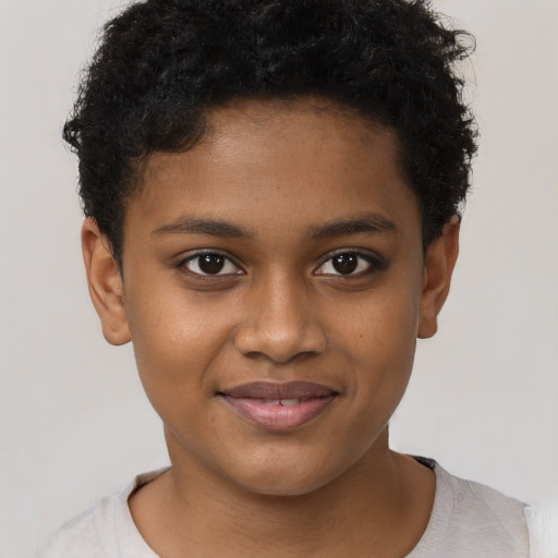 Joyful black child female with short  brown hair and brown eyes