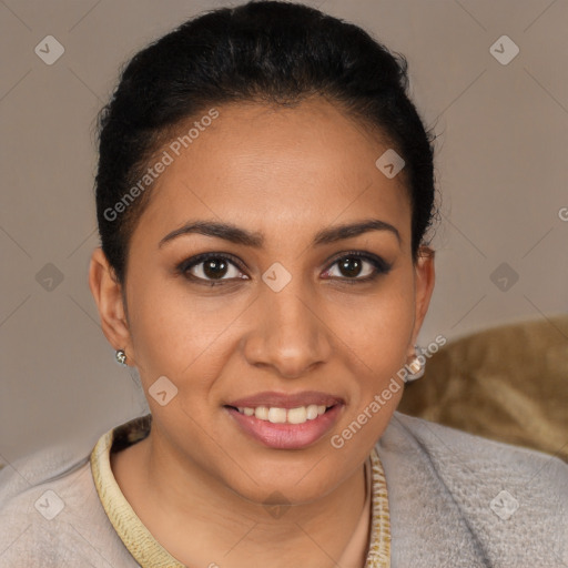 Joyful latino young-adult female with short  brown hair and brown eyes