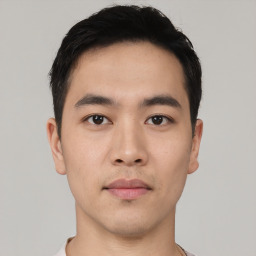 Neutral asian young-adult male with short  black hair and brown eyes