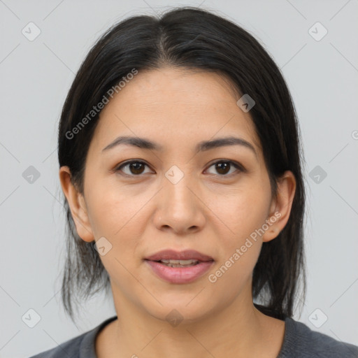 Joyful asian young-adult female with medium  brown hair and brown eyes