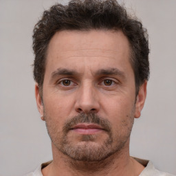 Neutral white adult male with short  brown hair and brown eyes