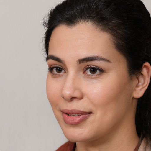 Joyful white young-adult female with medium  brown hair and brown eyes