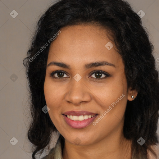 Joyful latino young-adult female with long  brown hair and brown eyes