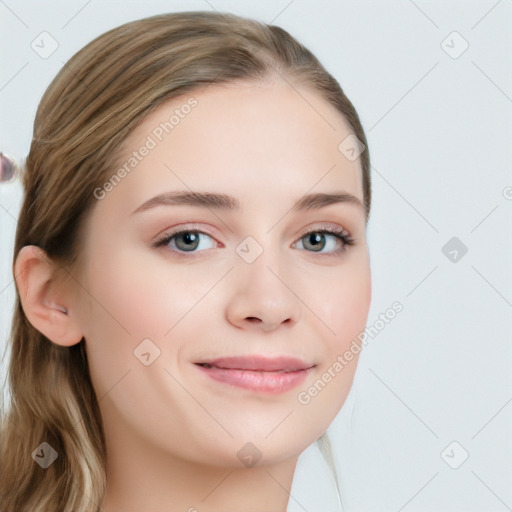 Joyful white young-adult female with long  brown hair and blue eyes