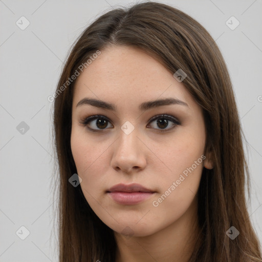 Neutral white young-adult female with long  brown hair and brown eyes