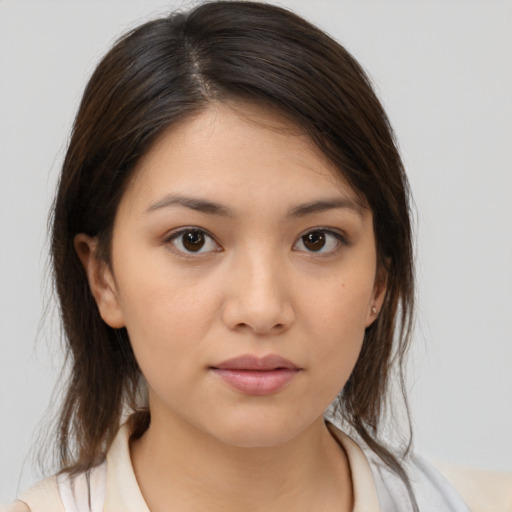 Neutral white young-adult female with medium  brown hair and brown eyes