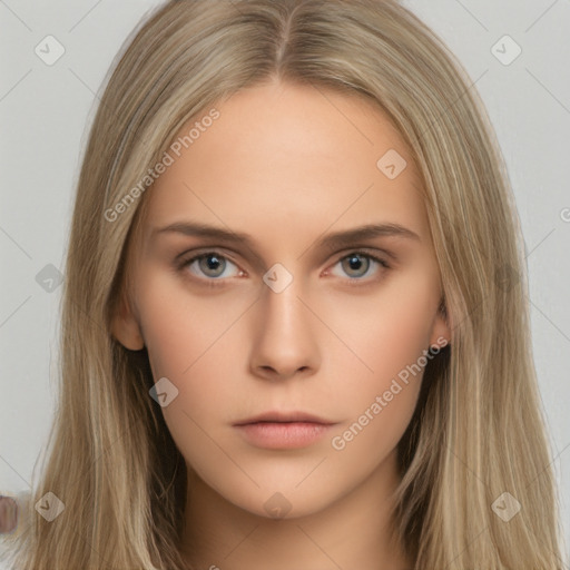 Neutral white young-adult female with long  brown hair and brown eyes