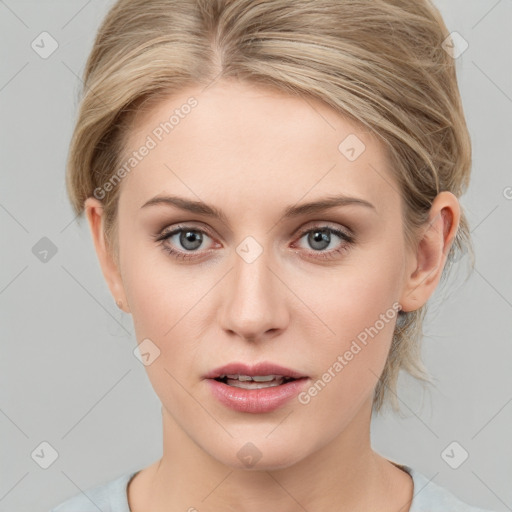 Joyful white young-adult female with medium  brown hair and blue eyes