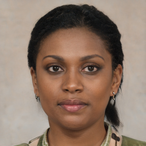 Neutral black young-adult female with medium  black hair and brown eyes