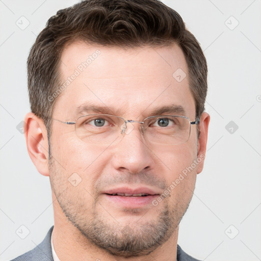 Joyful white adult male with short  brown hair and grey eyes