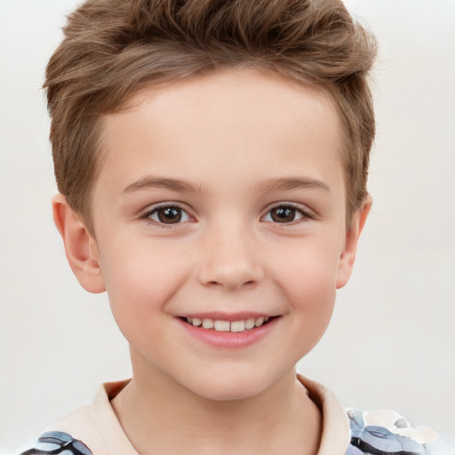 Joyful white child female with short  brown hair and brown eyes