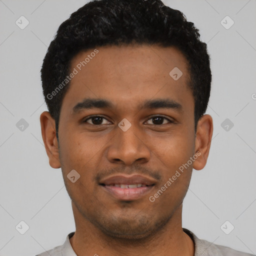Joyful latino young-adult male with short  black hair and brown eyes