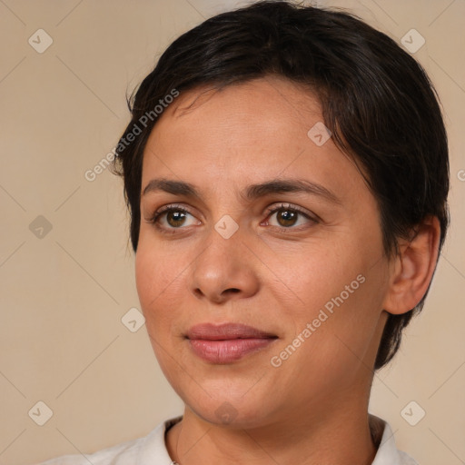 Joyful white adult female with medium  brown hair and brown eyes