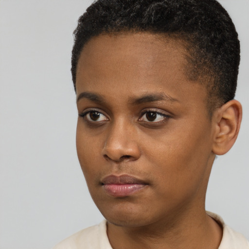 Neutral black young-adult female with short  black hair and brown eyes