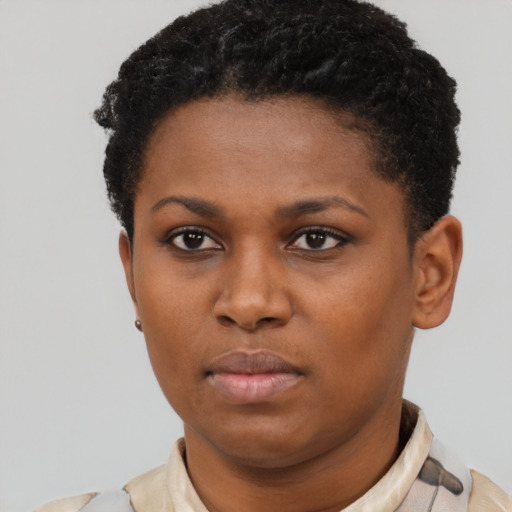 Neutral latino young-adult female with short  black hair and brown eyes