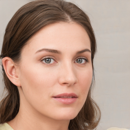 Neutral white young-adult female with medium  brown hair and grey eyes