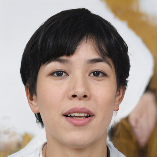 Joyful asian young-adult female with medium  black hair and brown eyes
