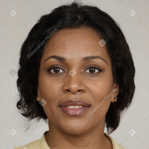 Joyful black young-adult female with medium  brown hair and brown eyes