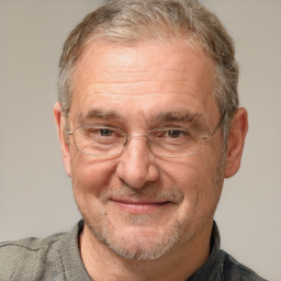 Joyful white middle-aged male with short  brown hair and grey eyes