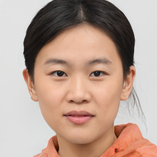 Neutral asian young-adult female with short  brown hair and brown eyes