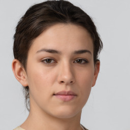 Neutral white young-adult female with short  brown hair and brown eyes