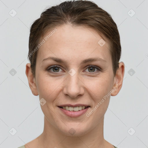 Joyful white young-adult female with short  brown hair and grey eyes