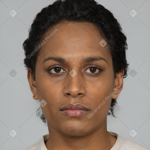 Neutral black young-adult female with short  black hair and brown eyes