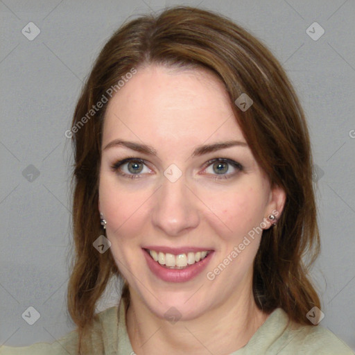 Joyful white young-adult female with long  brown hair and green eyes