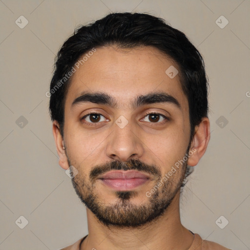 Joyful latino young-adult male with short  black hair and brown eyes