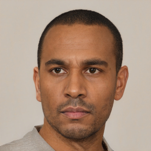 Neutral latino adult male with short  black hair and brown eyes