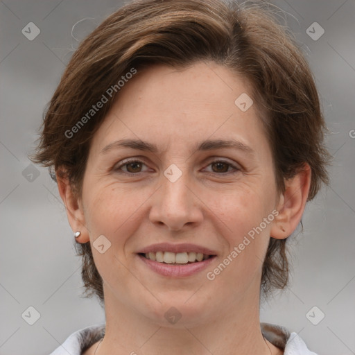 Joyful white adult female with medium  brown hair and grey eyes