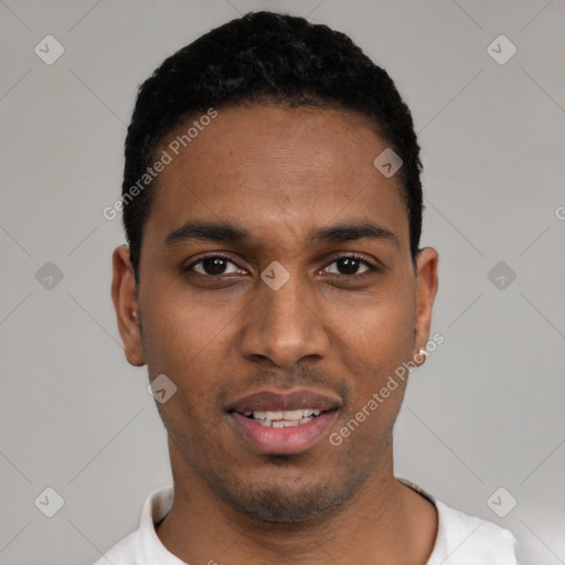 Joyful black young-adult male with short  black hair and brown eyes