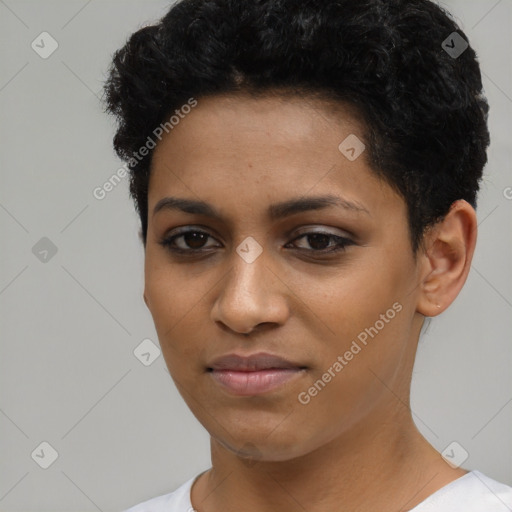 Joyful latino young-adult female with short  black hair and brown eyes