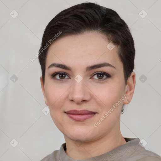 Joyful white young-adult female with short  brown hair and brown eyes