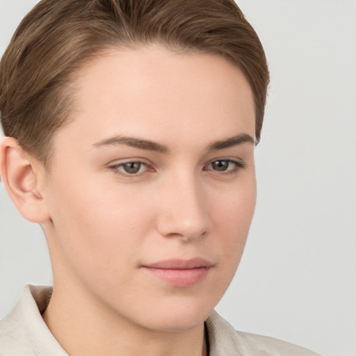 Neutral white young-adult female with short  brown hair and brown eyes