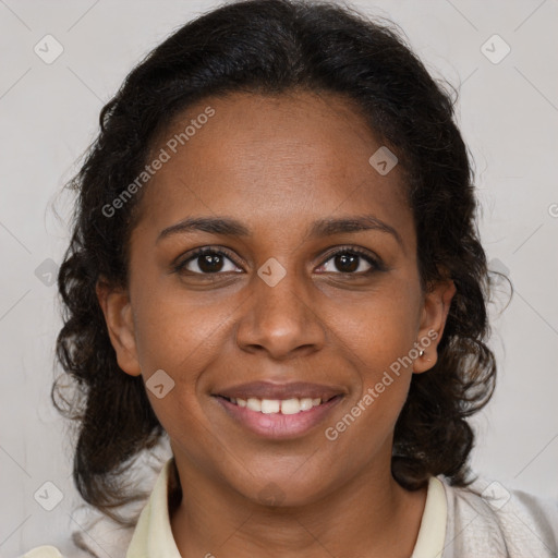 Joyful black young-adult female with medium  brown hair and brown eyes