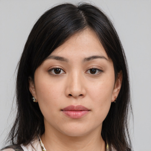 Neutral asian young-adult female with medium  brown hair and brown eyes