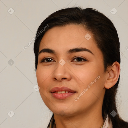 Joyful latino young-adult female with long  brown hair and brown eyes