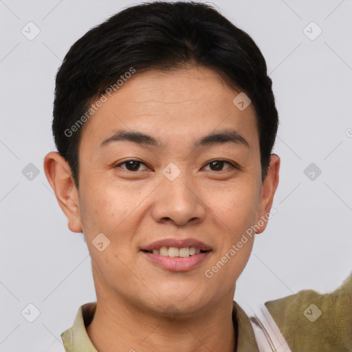 Joyful asian young-adult female with short  brown hair and brown eyes