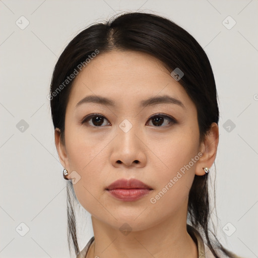 Neutral asian young-adult female with medium  black hair and brown eyes