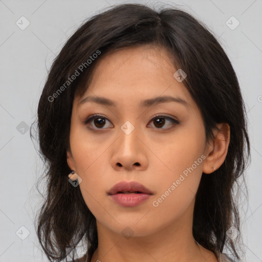 Neutral asian young-adult female with medium  brown hair and brown eyes