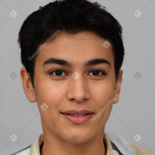 Joyful latino young-adult male with short  brown hair and brown eyes