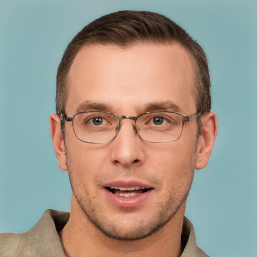 Joyful white adult male with short  brown hair and brown eyes