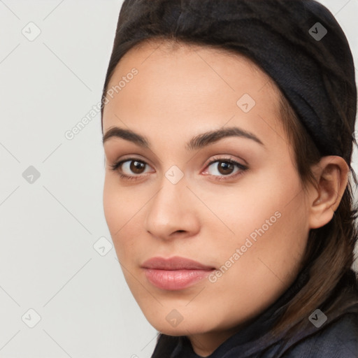 Neutral white young-adult female with long  brown hair and brown eyes