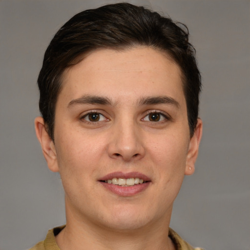 Joyful white young-adult female with short  brown hair and brown eyes