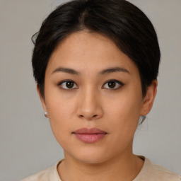 Neutral asian young-adult female with medium  brown hair and brown eyes