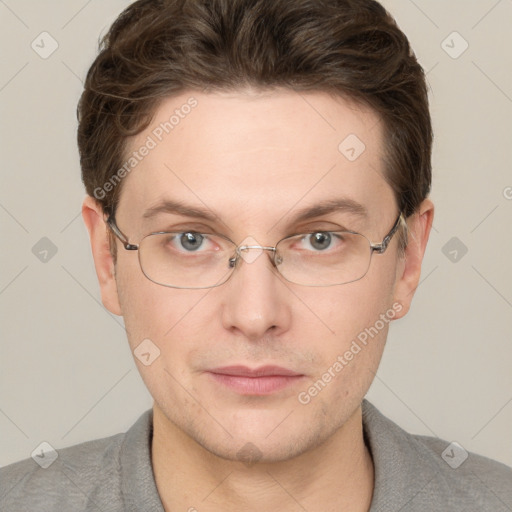 Joyful white adult male with short  brown hair and grey eyes