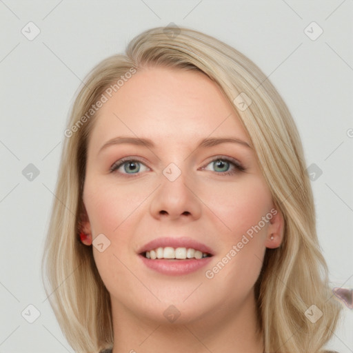 Joyful white young-adult female with long  brown hair and blue eyes