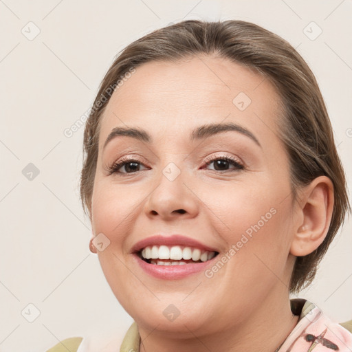 Joyful white young-adult female with medium  brown hair and brown eyes